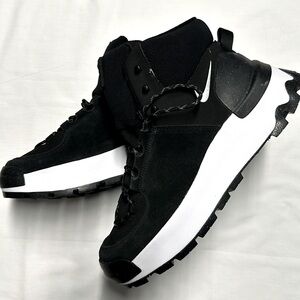 Nike Women’s size 11.5 black and white high top shoes